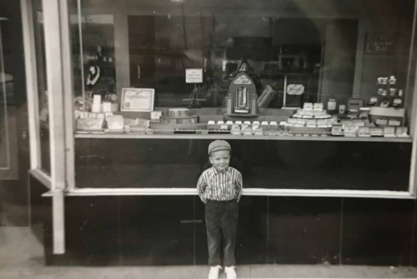 Little Kevin Schimke at his father's jewelry store in 1960.
